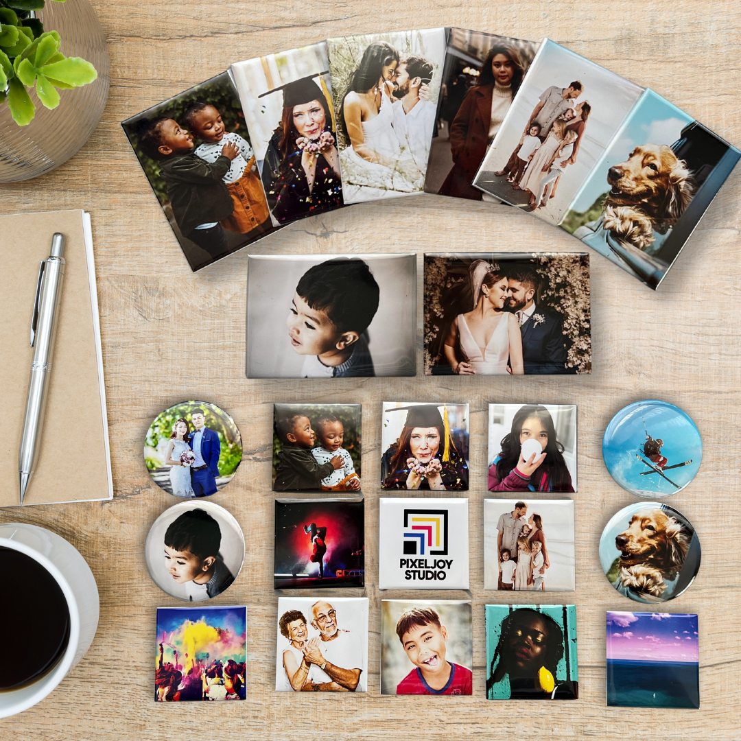 Collection of square, rectangle, and round photo magnets on a wooden surface with a coffee cup and pen.